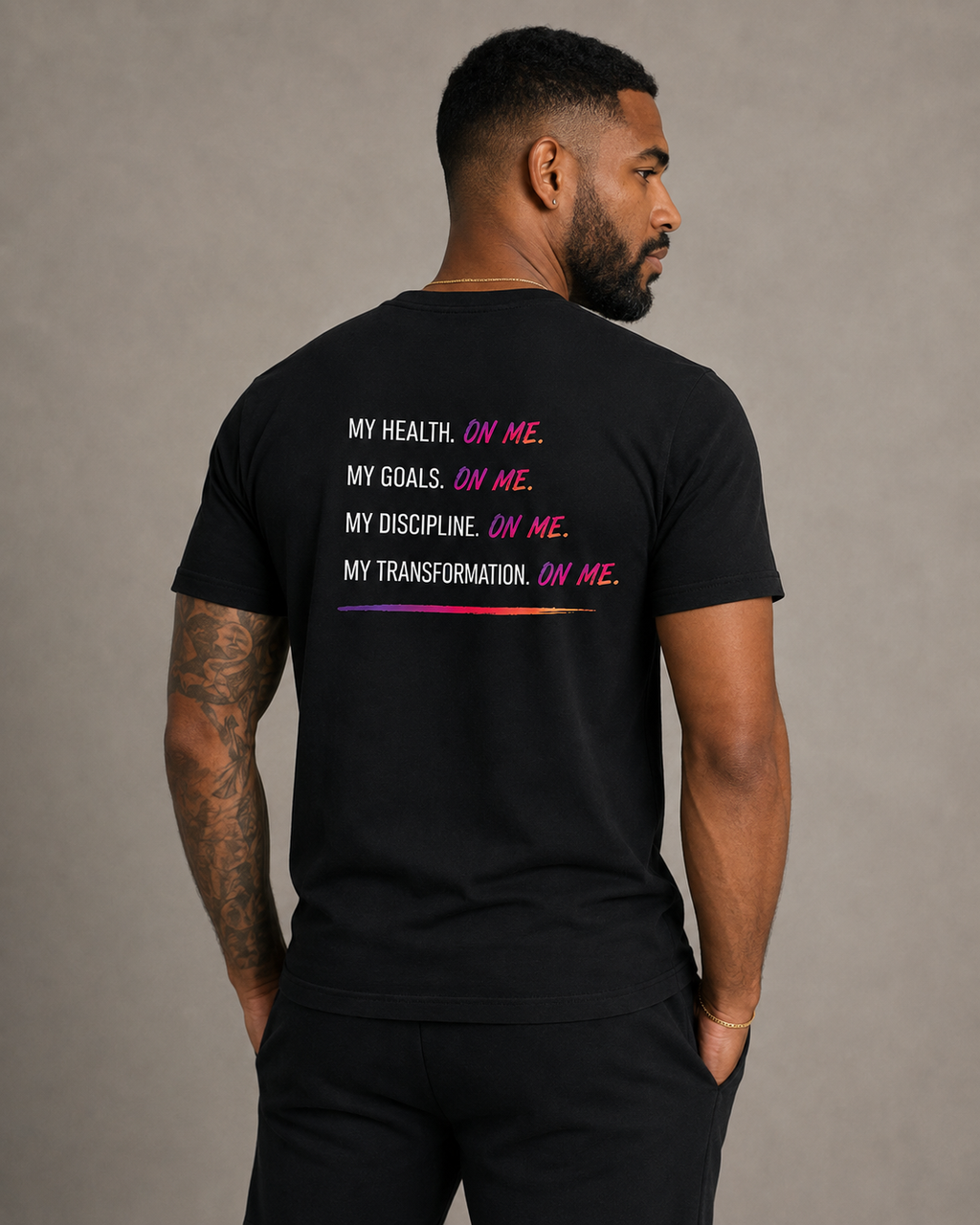 Male model wearing ON ME. Accountability Tee back view